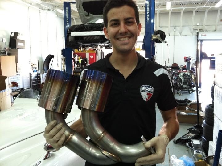 John Markadakis with titanium exhaust headers in the shop